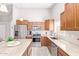Well-lit kitchen featuring modern appliances, spacious countertops, and ample storage at 1582 W Chicago St, Chandler, AZ 85224
