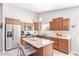 Kitchen featuring stainless steel appliances, granite countertops, and ample cabinet space at 1582 W Chicago St, Chandler, AZ 85224