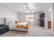 Bedroom with a ceiling fan, a comfortable bed, and neutral decor at 1582 W Chicago St, Chandler, AZ 85224
