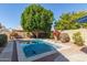 Refreshing pool nestled in a private backyard with mature trees and lush landscaping for outdoor enjoyment and relaxation at 1582 W Chicago St, Chandler, AZ 85224