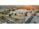 Aerial view of the neighborhood and golf course, offering a serene setting at 1708 W Harmont Dr, Phoenix, AZ 85021