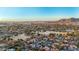 Beautiful aerial perspective of the community, with golf course access and scenic mountain views in the distance at 1708 W Harmont Dr, Phoenix, AZ 85021
