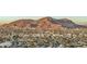 Stunning aerial view of the city and mountain ranges at 1708 W Harmont Dr, Phoenix, AZ 85021
