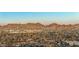 Scenic aerial view of the neighborhood with mountains in the background at 1708 W Harmont Dr, Phoenix, AZ 85021