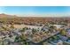 Panoramic aerial shot of the community with lush golf course views, showcasing residences and desert landscaping at 1708 W Harmont Dr, Phoenix, AZ 85021
