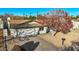 Charming single-Gathering home with a well-manicured lawn and freshly painted garage door and neutral exterior paint at 1708 W Harmont Dr, Phoenix, AZ 85021
