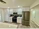 Well-equipped kitchen features stainless steel appliances, ample cabinet space, and modern countertops at 1708 W Harmont Dr, Phoenix, AZ 85021