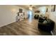 Open living area featuring neutral flooring, shelving, and contemporary decor at 1708 W Harmont Dr, Phoenix, AZ 85021