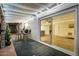 Covered patio with sliding glass door access to the home and backyard at 1708 W Harmont Dr, Phoenix, AZ 85021