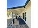 Enjoy outdoor living on this patio with decorative curtains and outdoor furniture at 1708 W Harmont Dr, Phoenix, AZ 85021