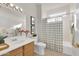 Clean bathroom with shower/tub combo and updated vanity at 18603 N Twilight Way, Surprise, AZ 85374