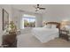 Bright bedroom with a queen-size bed and lots of natural light at 18603 N Twilight Way, Surprise, AZ 85374