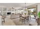 Bright dining area with a wooden table and access to backyard at 18603 N Twilight Way, Surprise, AZ 85374