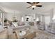 Spacious living area featuring an open floor plan and a large window at 18603 N Twilight Way, Surprise, AZ 85374
