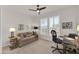 Home office with built-in desk and comfortable seating at 18603 N Twilight Way, Surprise, AZ 85374