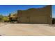 Long driveway leading to a two-car garage at 210 W Yucca Ln, New River, AZ 85087