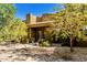 Desert landscaping and stucco exterior of a single-story home at 210 W Yucca Ln, New River, AZ 85087