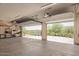 Spacious three-car garage with opener and storage at 210 W Yucca Ln, New River, AZ 85087