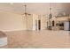 Spacious living room with tile floors and high ceilings at 210 W Yucca Ln, New River, AZ 85087