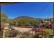 Spacious patio with mountain views and string lights at 210 W Yucca Ln, New River, AZ 85087
