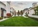 Landscaped backyard with lush lawn and mountain views at 21487 N 110Th Pl, Scottsdale, AZ 85255