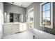 Luxurious bathroom with soaking tub and mountain views at 21487 N 110Th Pl, Scottsdale, AZ 85255
