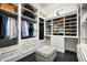 Well-organized closet with shoe storage and hanging space at 21487 N 110Th Pl, Scottsdale, AZ 85255