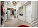 Large walk-in closet with custom built-ins and laundry area at 21487 N 110Th Pl, Scottsdale, AZ 85255