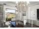 Bright dining room with French doors opening to a hilltop view at 21487 N 110Th Pl, Scottsdale, AZ 85255