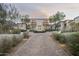 Elegant home exterior with a grand entrance at 21487 N 110Th Pl, Scottsdale, AZ 85255