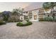 Home exterior with fountain and grand entrance, mountain views at 21487 N 110Th Pl, Scottsdale, AZ 85255