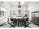Gourmet kitchen features white cabinetry, marble countertops, and high-end appliances at 21487 N 110Th Pl, Scottsdale, AZ 85255
