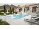 Inviting pool area with a waterfall feature at 21487 N 110Th Pl, Scottsdale, AZ 85255