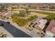Aerial view of house, yard, and neighborhood at 2608 E Desert Wind Dr, Casa Grande, AZ 85194