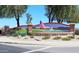 Mission Royale Golf Course entrance with painted mural and flag at 2608 E Desert Wind Dr, Casa Grande, AZ 85194