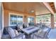 Covered patio with comfortable seating and fire pit at 2608 E Desert Wind Dr, Casa Grande, AZ 85194