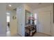 Bright entryway with mirror and a view of the living room at 2608 E Desert Wind Dr, Casa Grande, AZ 85194