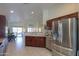 Kitchen with island and stainless steel appliances at 2608 E Desert Wind Dr, Casa Grande, AZ 85194