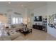 Open concept living room with a view of the kitchen and dining area at 2608 E Desert Wind Dr, Casa Grande, AZ 85194