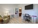 Home office features a desk, chair, and built-in shelving at 2608 E Desert Wind Dr, Casa Grande, AZ 85194