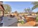 Relaxing patio furniture with fire pit and view of the golf course at 2608 E Desert Wind Dr, Casa Grande, AZ 85194