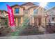 Inviting townhome with manicured landscaping, brick accents, and a visible 'Available' sign at 2828 N Evergreen St, Buckeye, AZ 85396