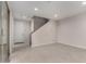 Large living room and stairway provides a roomy, uncluttered atmosphere at 2828 N Evergreen St, Buckeye, AZ 85396