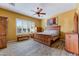 Main bedroom with wood flooring and large window at 3735 W Links Dr, Phoenix, AZ 85086