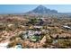 Aerial view of a home with mountain views and a large lot at 3827 E Marlette Ave, Paradise Valley, AZ 85253