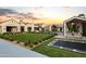 Spacious backyard with lawn, trampoline, and outdoor seating at 3827 E Marlette Ave, Paradise Valley, AZ 85253