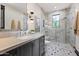 Modern bathroom with a large walk-in shower and stylish vanity at 3827 E Marlette Ave, Paradise Valley, AZ 85253