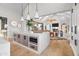 Open concept kitchen features a large island, breakfast bar, and views into Gathering room at 3827 E Marlette Ave, Paradise Valley, AZ 85253