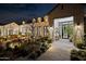 Relaxing outdoor patio area with fire pit and lush landscaping at 3827 E Marlette Ave, Paradise Valley, AZ 85253