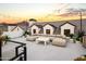 Relaxing rooftop terrace with seating area, string lights, and city views at 3827 E Marlette Ave, Paradise Valley, AZ 85253